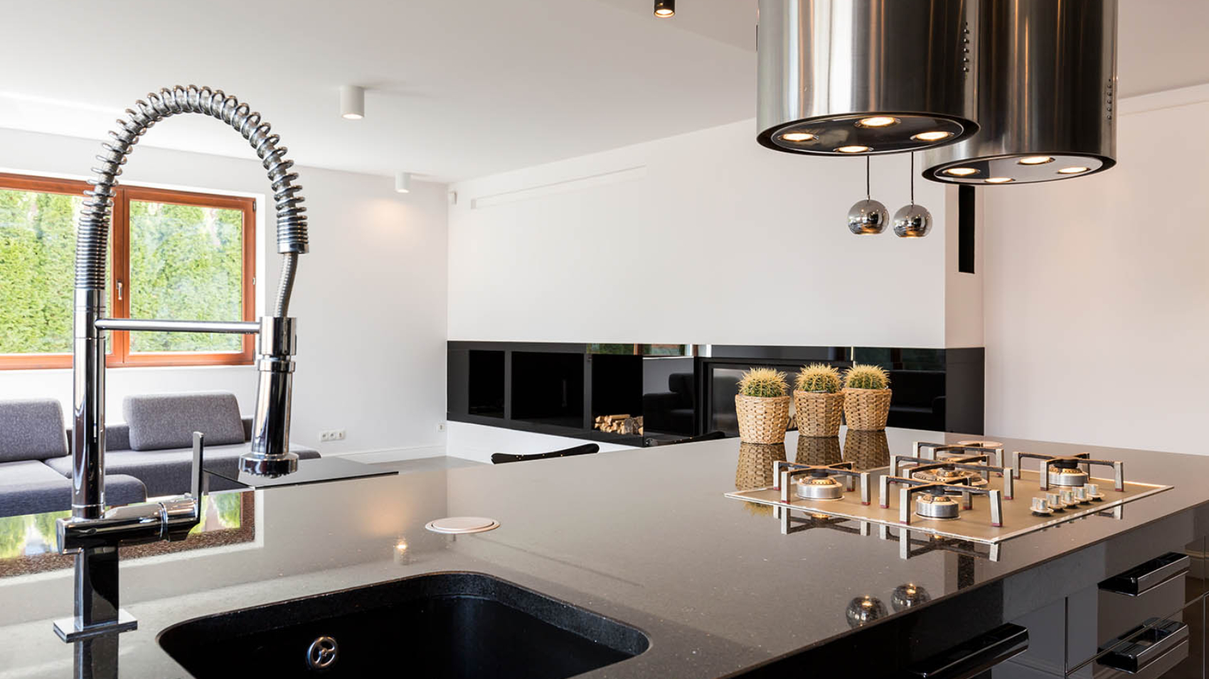Modern kitchen interior with a high-polished countertop and sink