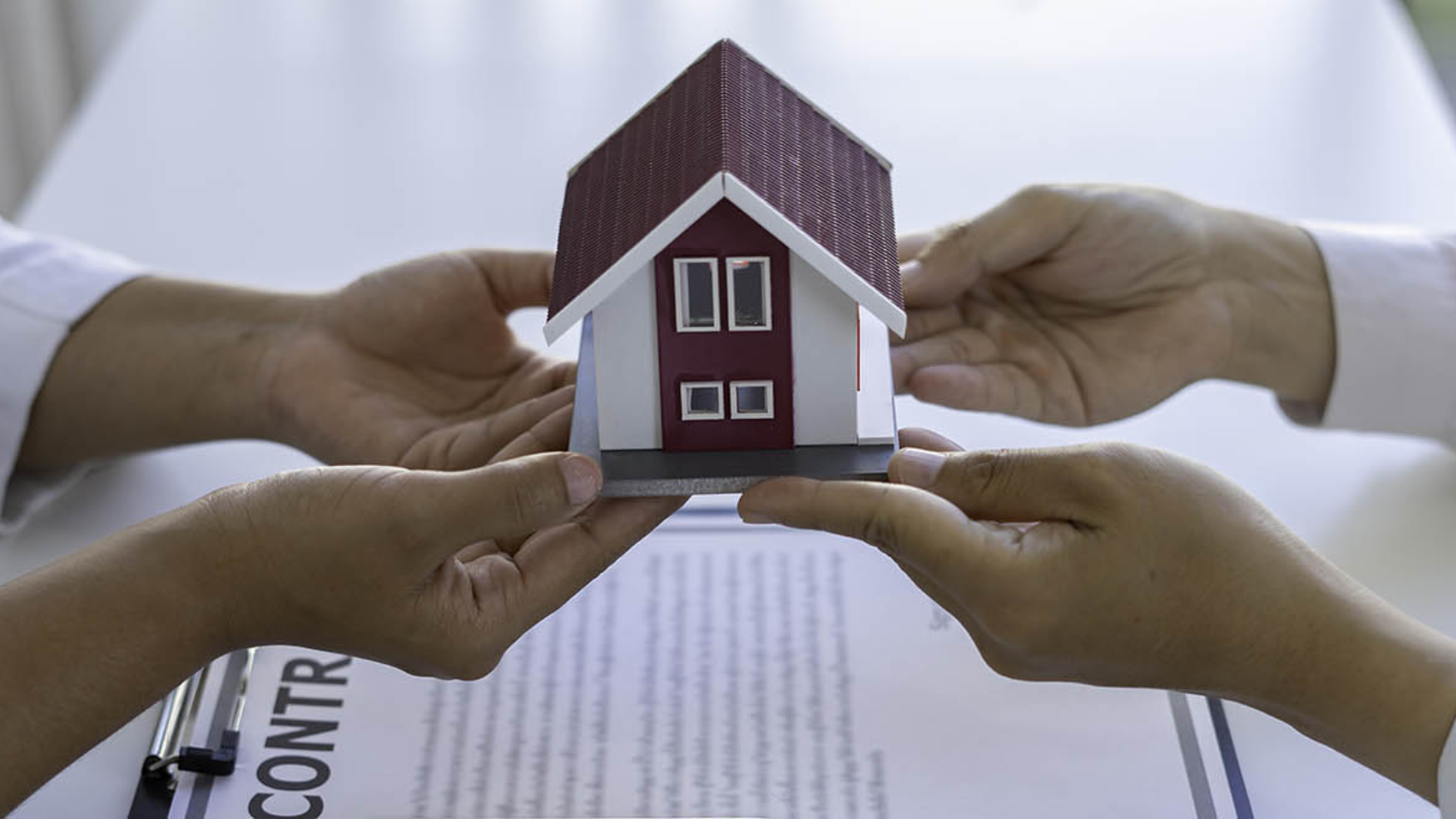 Real estate brokerage agent Deliver samples of homes offered for sale, pay deposit and sign contracts, home insurance concepts. Making lease and buying a house