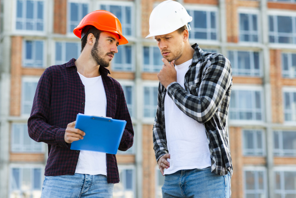 medium-shot-engineer-construction-worker-talking