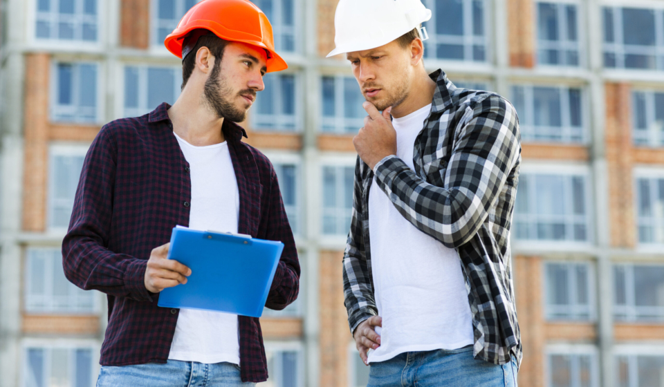 medium-shot-engineer-construction-worker-talking