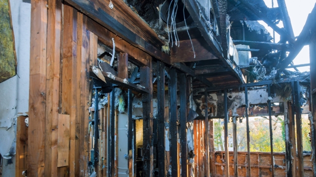 Fire and smoke damaged room after a house fire