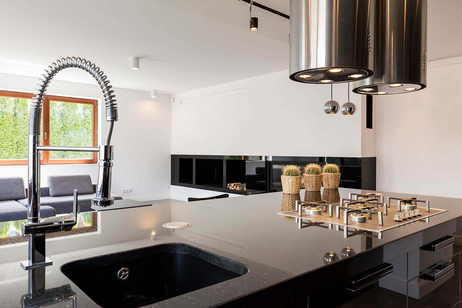 Modern kitchen interior with a high-polished countertop and sink