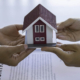 Real estate brokerage agent Deliver samples of homes offered for sale, pay deposit and sign contracts, home insurance concepts. Making lease and buying a house