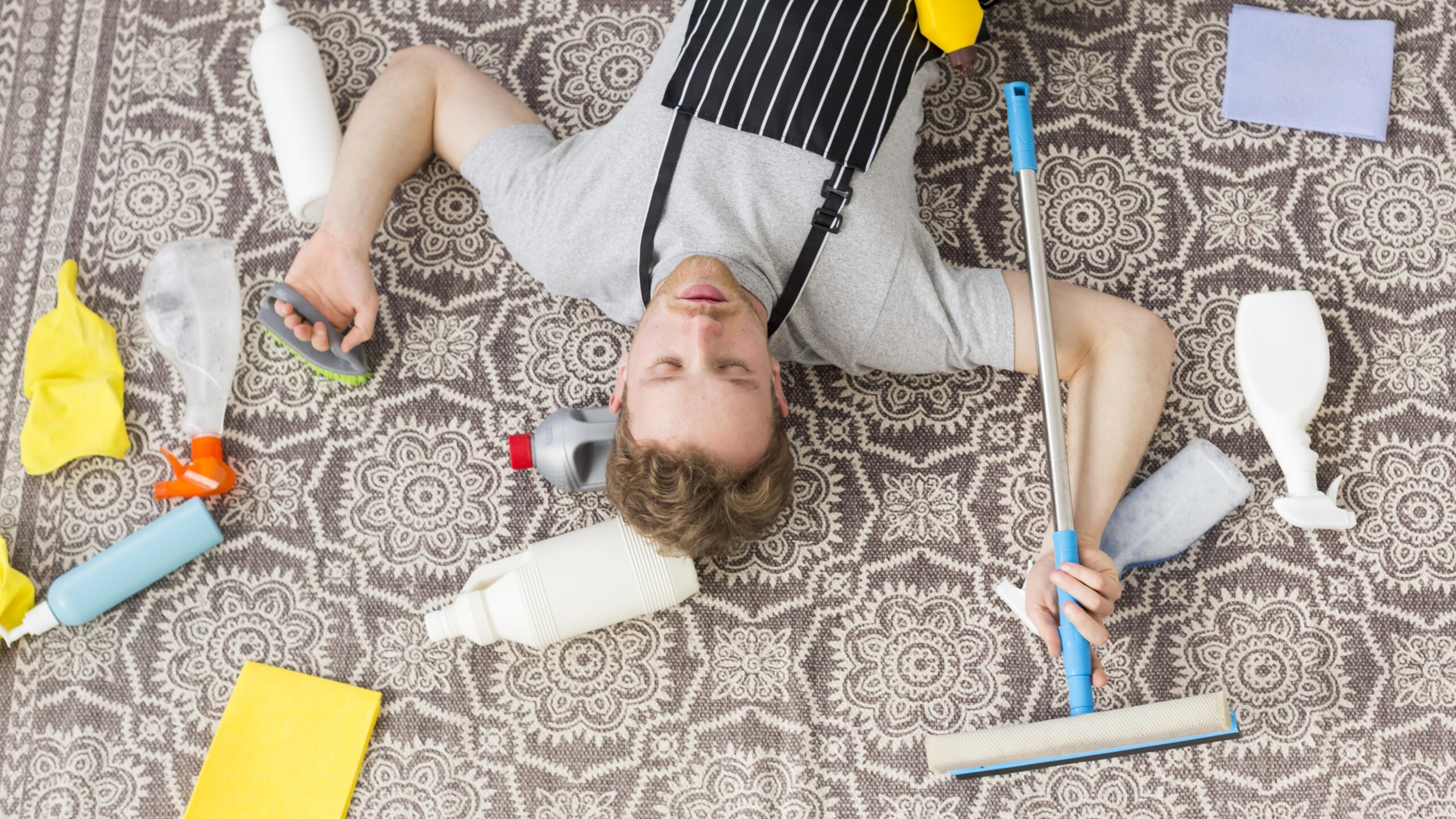 top-view-man-tired-from-cleaning